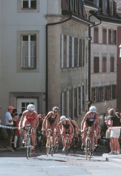 The lead pack approaches the apex of the bike.